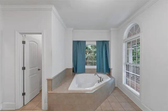 a room with furniture and wooden floor