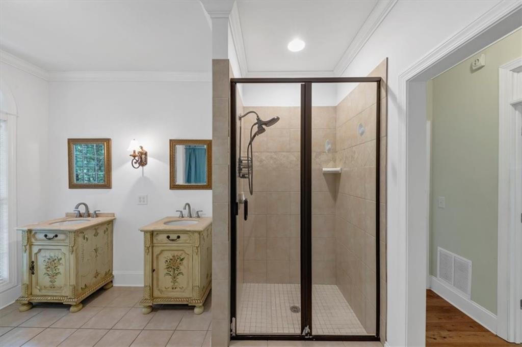 231 Beaver Ridge Road Jasper, GA 30143 - Photo 38 of 80 a bathroom with a granite countertop sink a vanity and a mirror