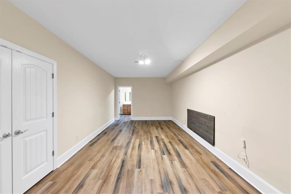 231 Beaver Ridge Road Jasper, GA 30143 - Photo 63 of 80 a view of wooden floor in an empty room