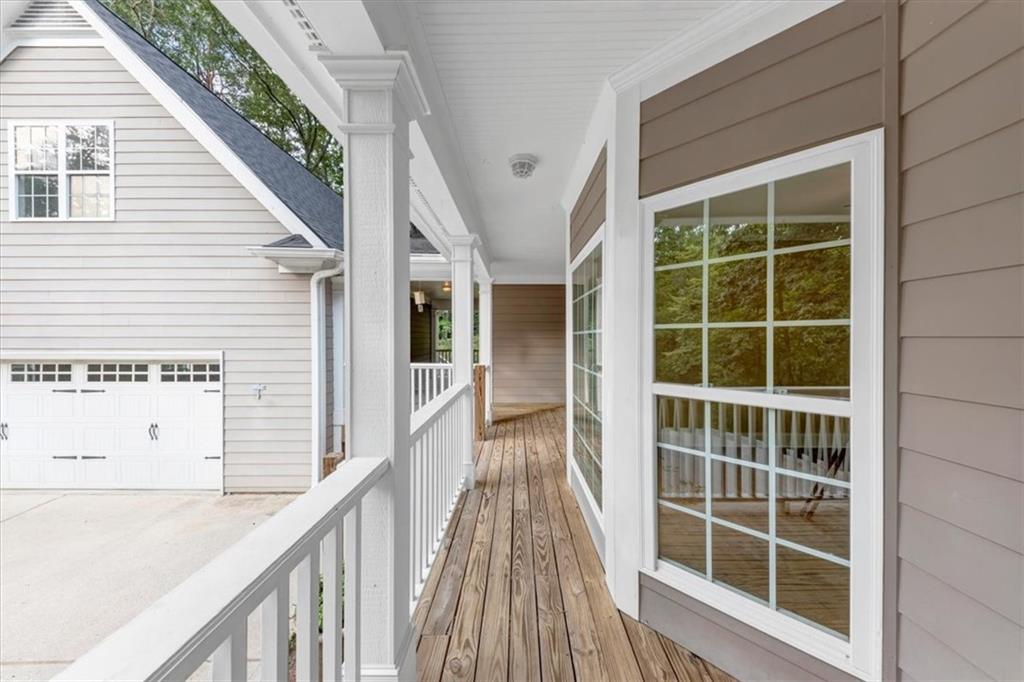 231 Beaver Ridge Road Jasper, GA 30143 - Photo 7 of 80 a view of balcony with wooden floor and windows