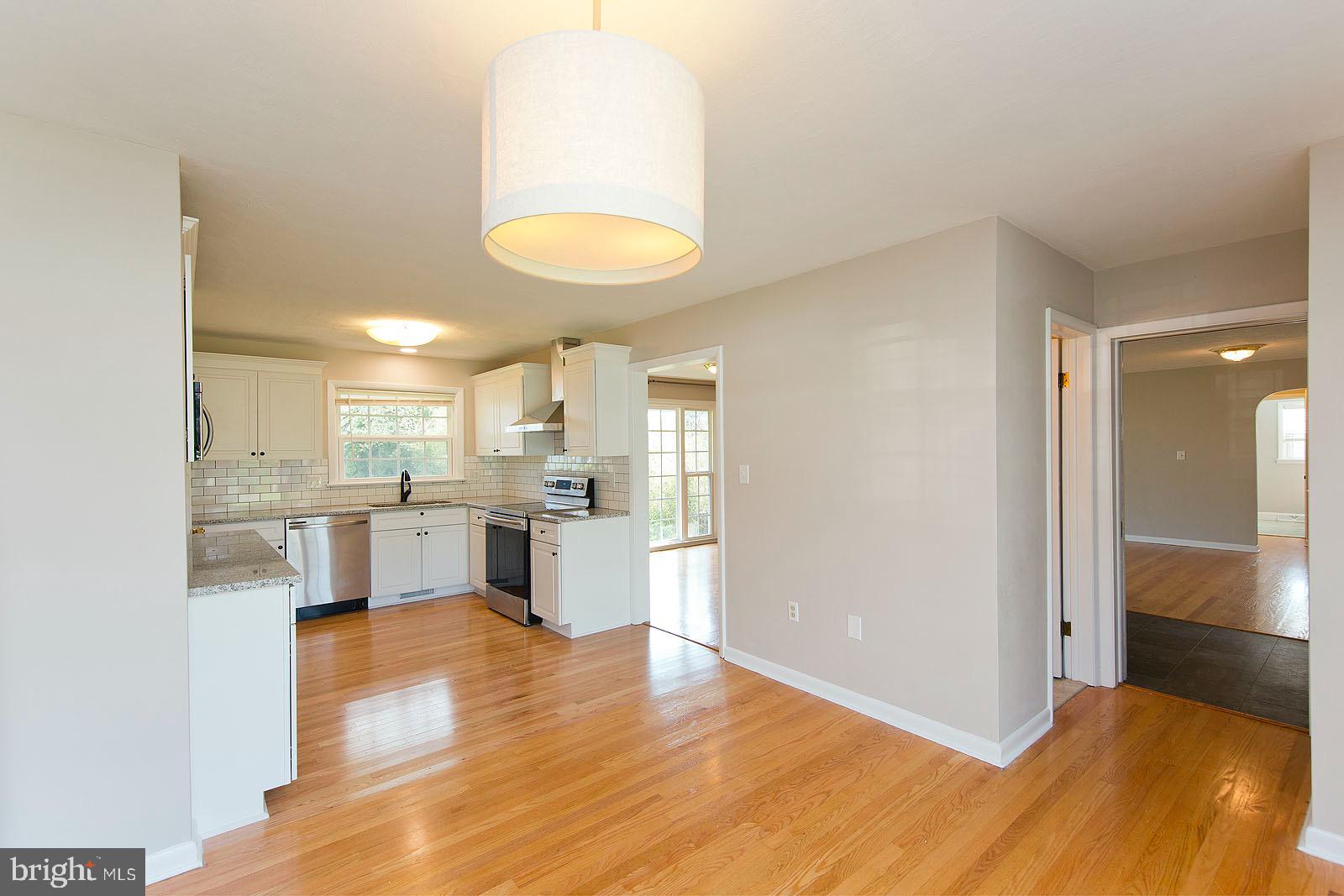 424 Beechcroft Road Winchester, VA 22601 - Photo 12 of 43 Half bath is between kitchen and great room