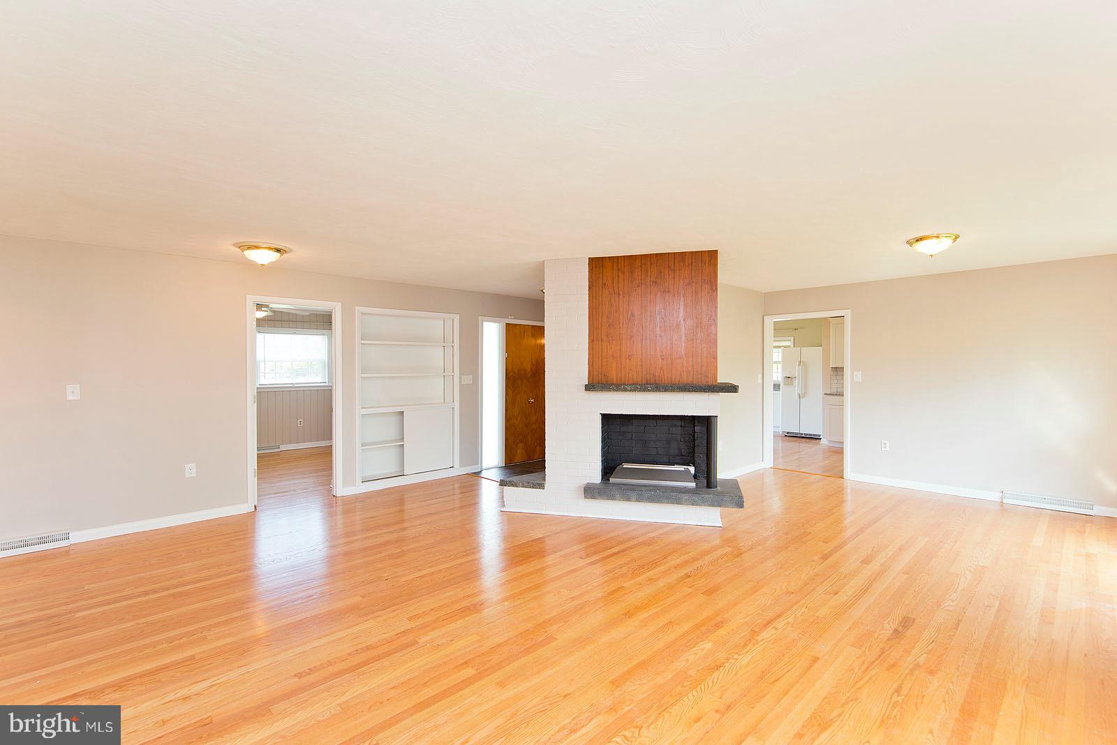 424 Beechcroft Road Winchester, VA 22601 - Photo 17 of 43 Great room hard wood floors sparkle in the light