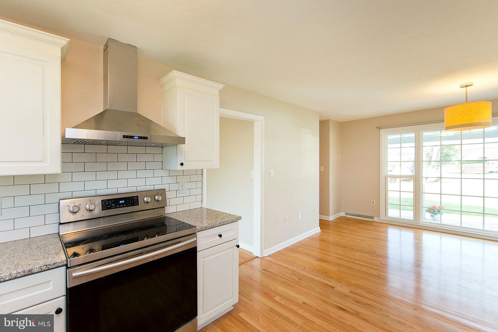 424 Beechcroft Road Winchester, VA 22601 - Photo 9 of 43 Stainless steel smooth top stove and range hood