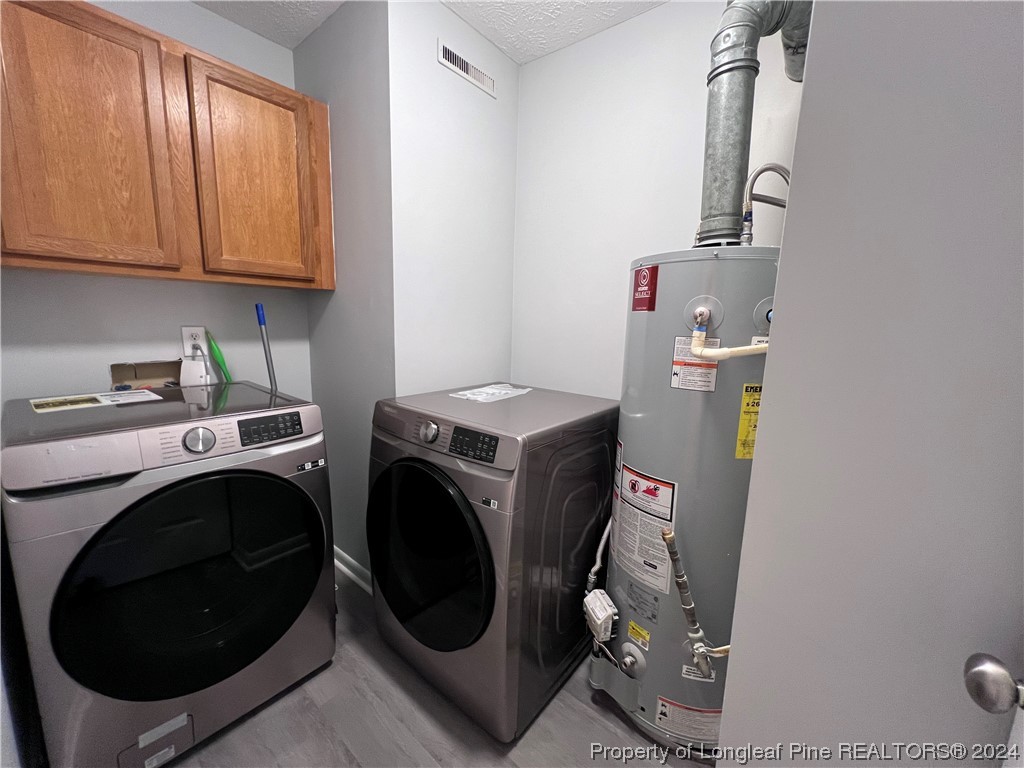 3375 Galleria Drive, Unit 17 Fayetteville, NC 28303 - Photo 14 of 19 a utility room with dryer and washer