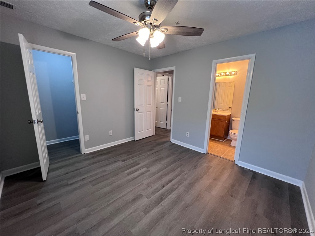 3375 Galleria Drive, Unit 17 Fayetteville, NC 28303 - Photo 15 of 19 an empty room with wooden floor and a ceiling fan