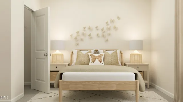 a bed room with a bed and a chair