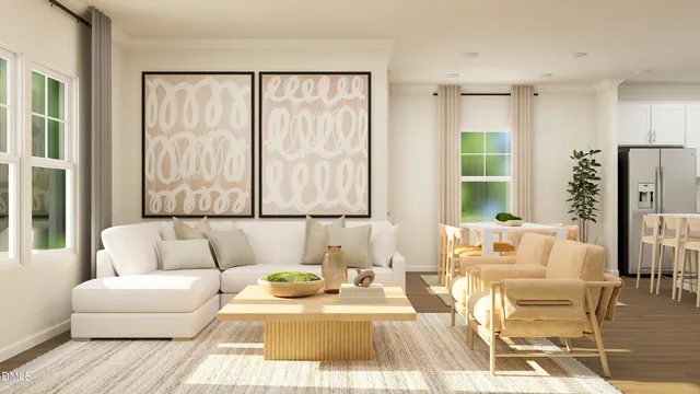 a living room with furniture and large windows