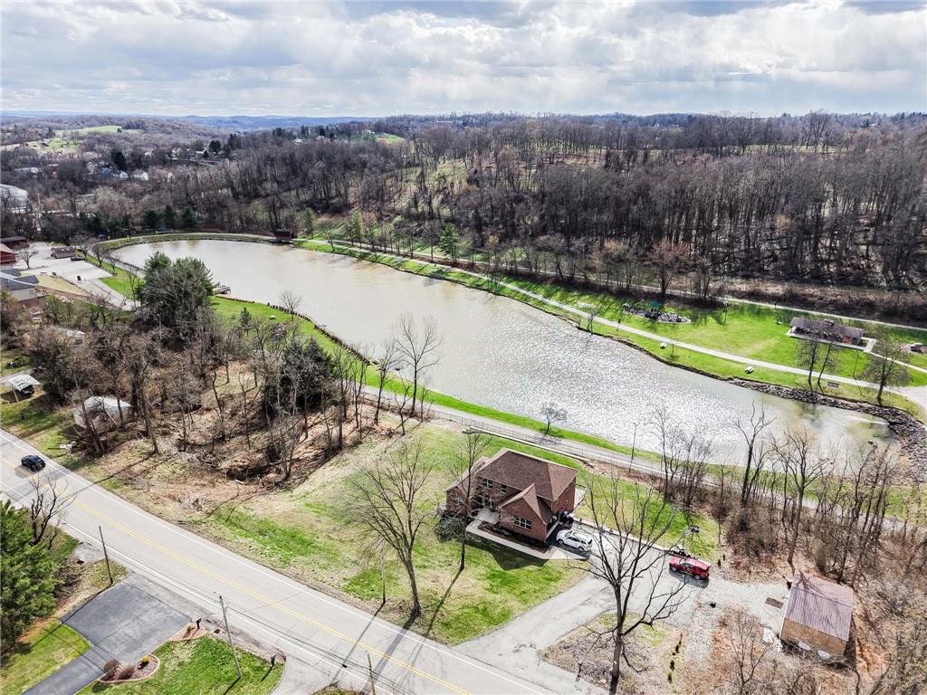Tbd Clay Pike Irwin, PA 15642 - Photo 5 of 7 a view of a lake with a yard