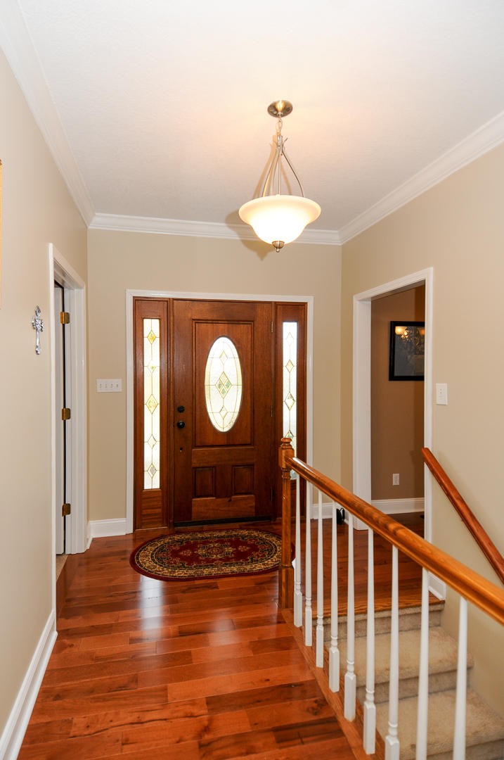 5656 North Trigonia Road Greenback, TN 37742 - Photo 3 of 40 a view of a hallway to a livingroom and a hall with wooden floor