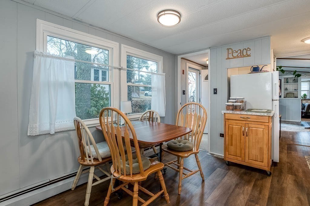 5 Timber Lane Wareham, MA 02571 - Photo 16 of 31 a dining room with furniture window and wooden floor