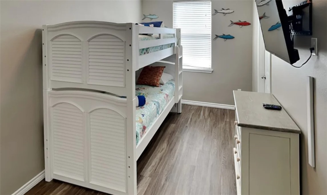 14916 Packery View Loop Corpus Christi, TX 78418 - Photo 17 of 32 a view of walk in closet with clothes and shoes
