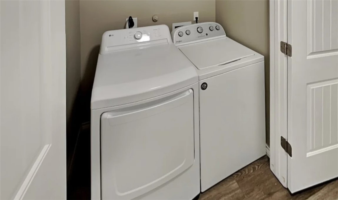 14916 Packery View Loop Corpus Christi, TX 78418 - Photo 23 of 32 a utility room with dryer and washer