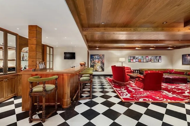a kitchen with a stove and a refrigerator