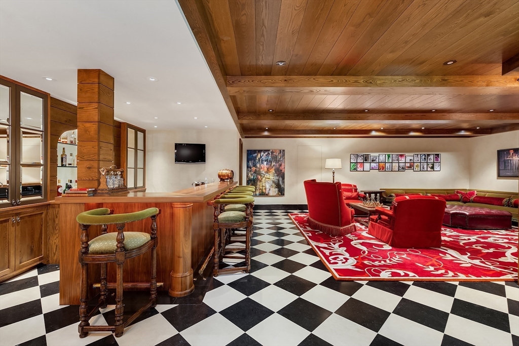 180 Ash Street Weston, MA 02493 - Photo 32 of 39 a kitchen with a stove and a refrigerator