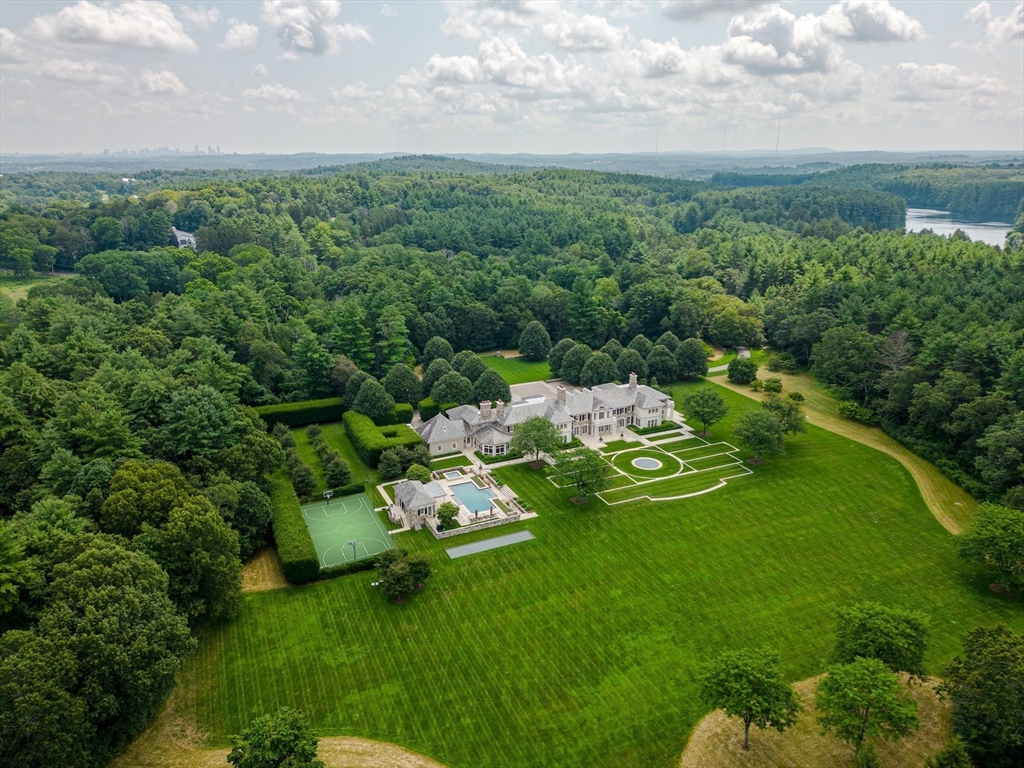 180 Ash Street Weston, MA 02493 - Photo 37 of 39 a view of a golf course with chairs