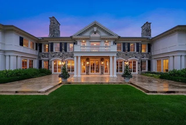 swimming pool view with a seating space