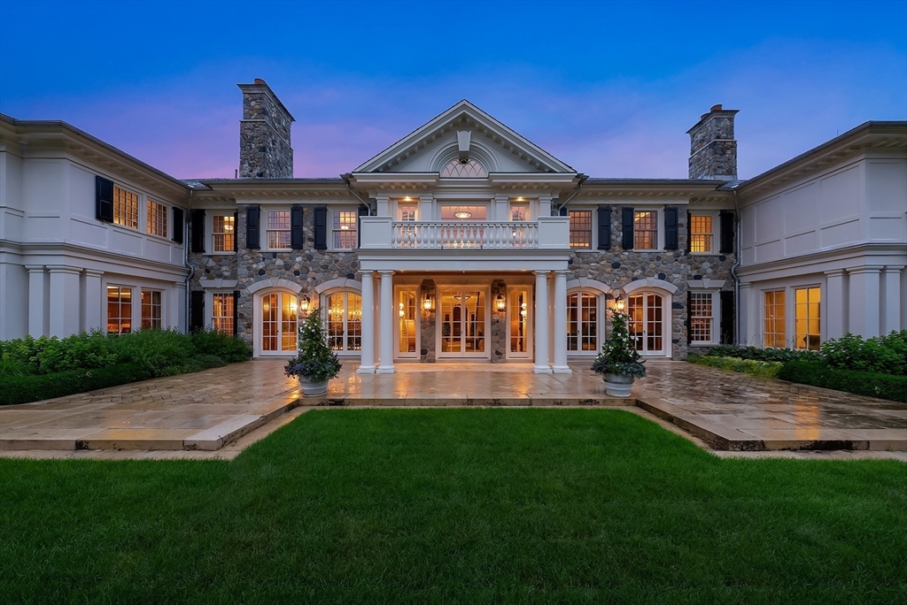 180 Ash Street Weston, MA 02493 - Photo 38 of 39 a front view of a building with a yard