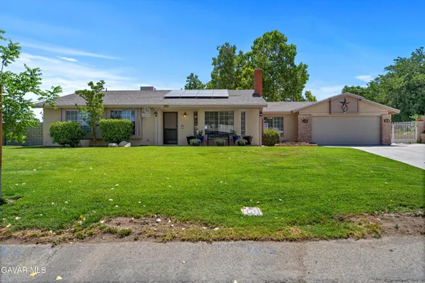 a front view of house with yard