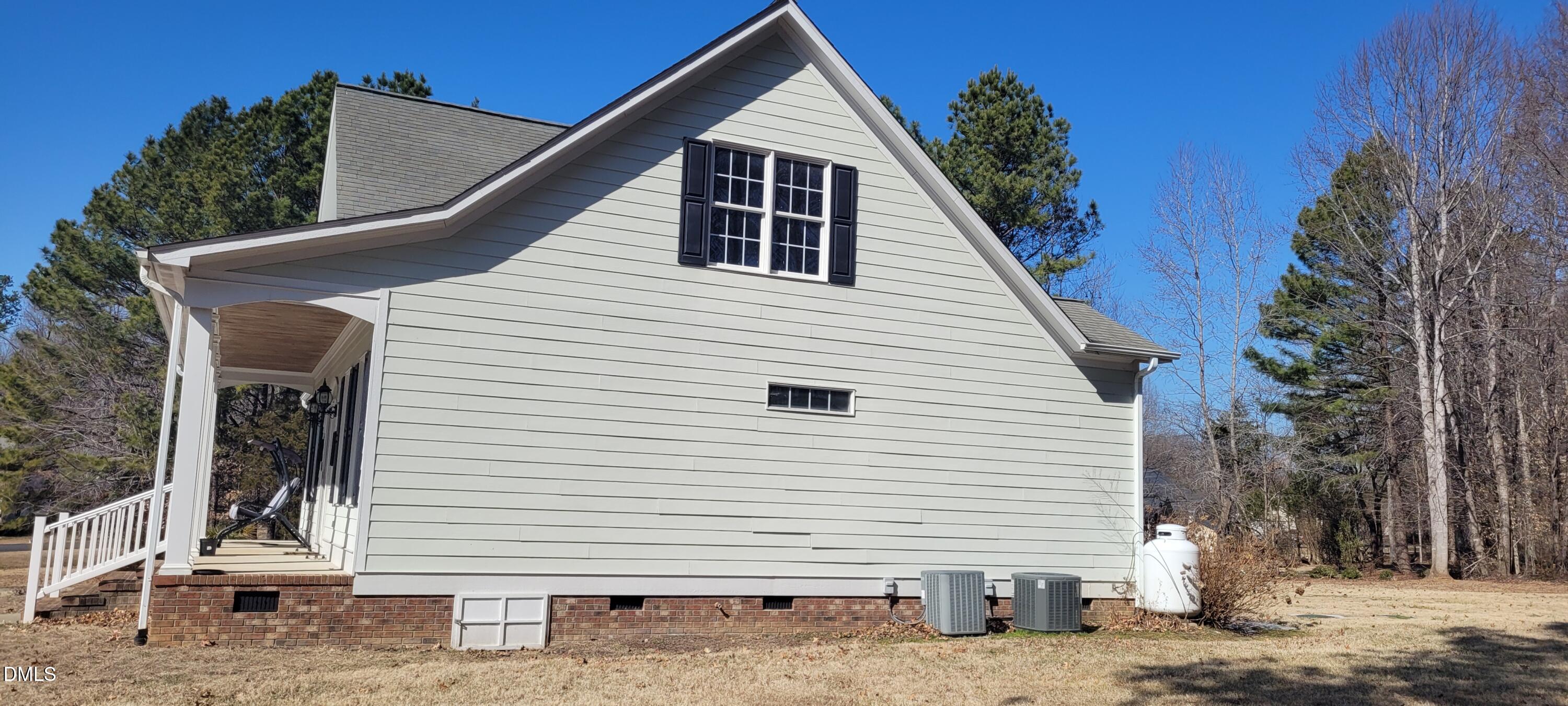 226 Fletcher Ridge Road Timberlake, NC 27583 - Photo 25 of 30 a view of a house with a yard
