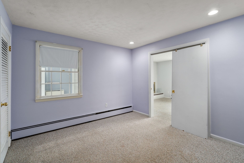 62 Nelson Place Worcester, MA 01605 - Photo 15 of 33 an empty room with a empty space and windows