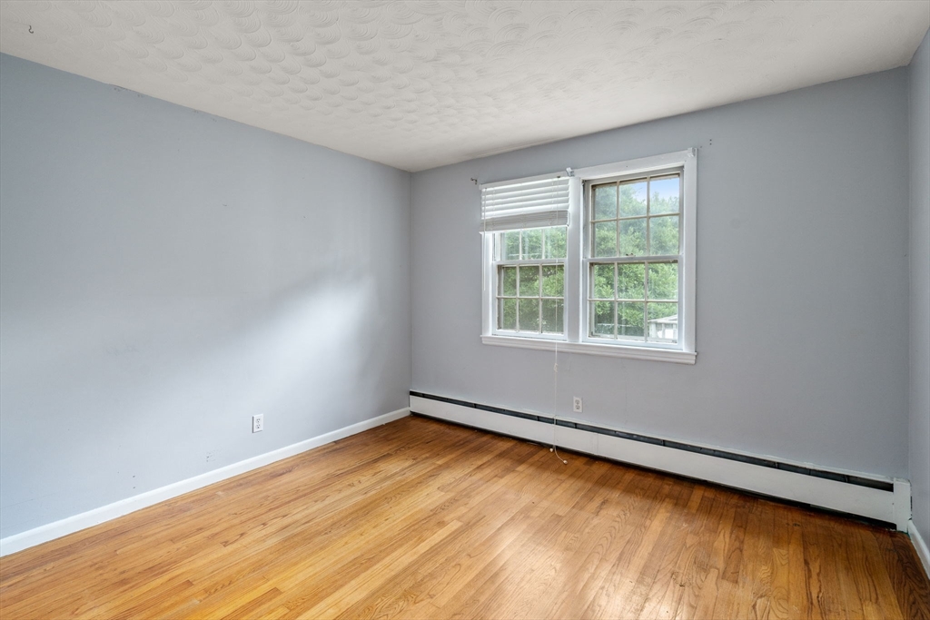 62 Nelson Place Worcester, MA 01605 - Photo 16 of 33 an empty room with a window