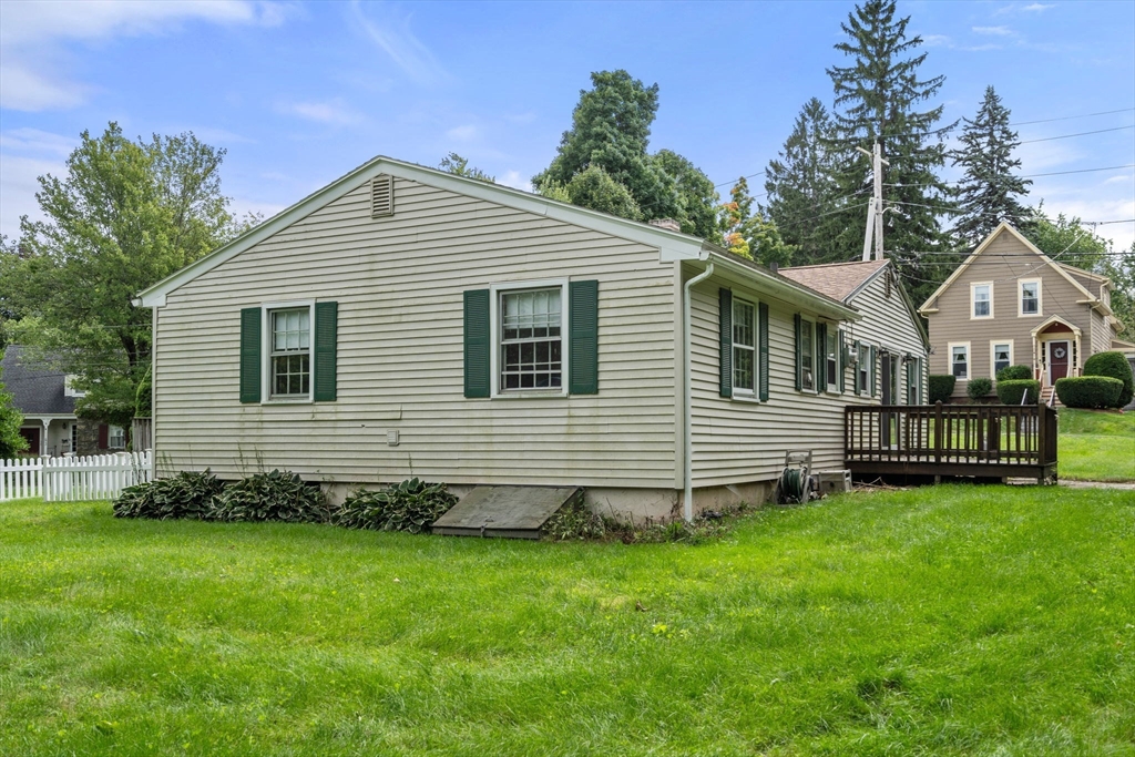 62 Nelson Place Worcester, MA 01605 - Photo 23 of 33 a view of a house with a yard and sitting area