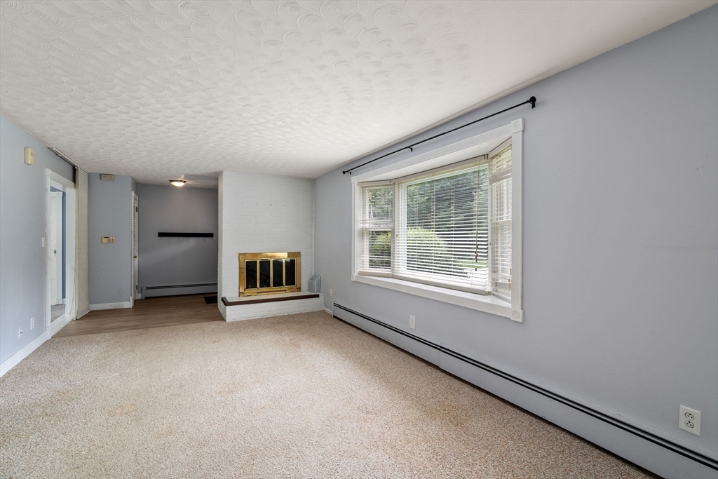 62 Nelson Place Worcester, MA 01605 - Photo 8 of 33 an empty room with windows