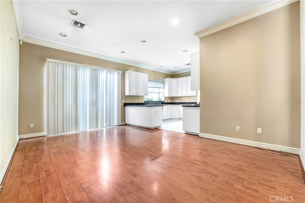 17919 Califa Street Encino, CA 91316 - Photo 2 of 11 a view of a kitchen with wooden floor