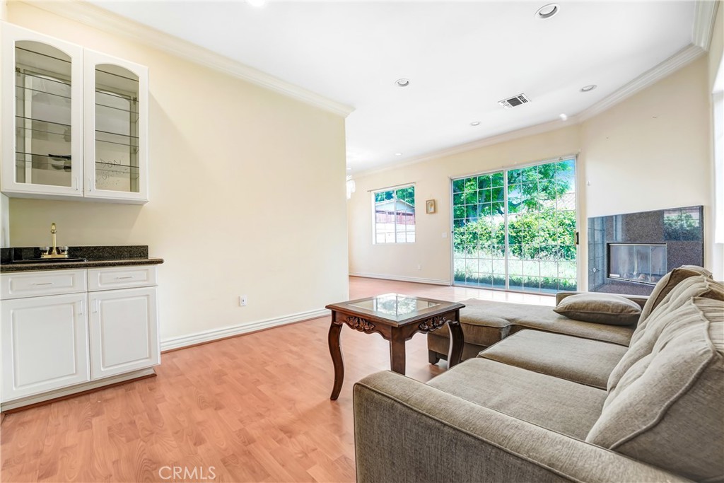 17919 Califa Street Encino, CA 91316 - Photo 5 of 11 a living room with furniture and a window
