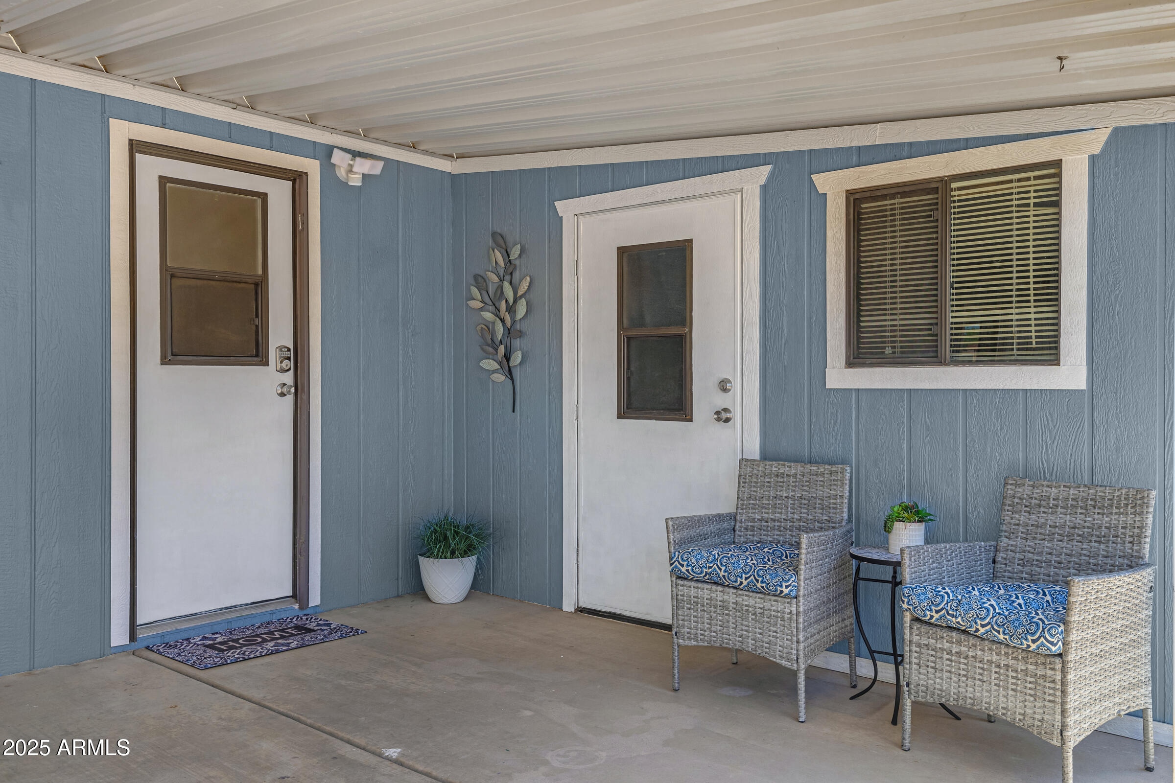 834 South Meridian Road, Unit 156 Apache Junction, AZ 85120 - Photo 17 of 20 a view of an entrance to house with yard