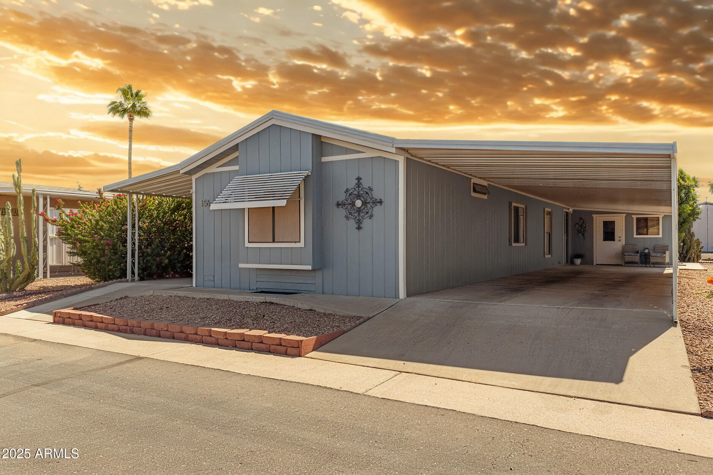 834 South Meridian Road, Unit 156 Apache Junction, AZ 85120 - Photo 18 of 20 a view of a house with a patio