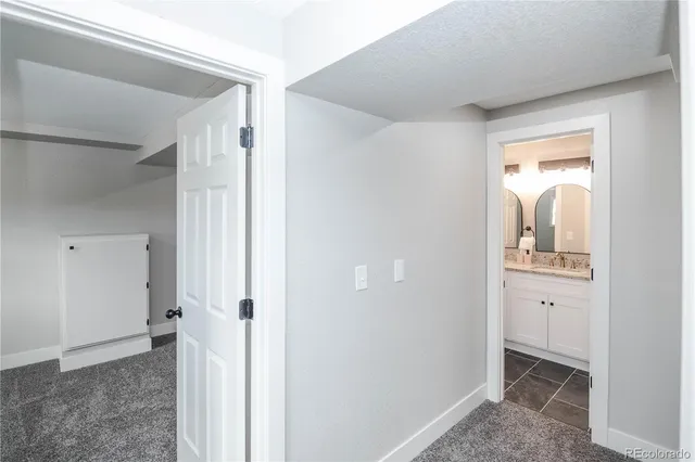 a view of hallway with sink