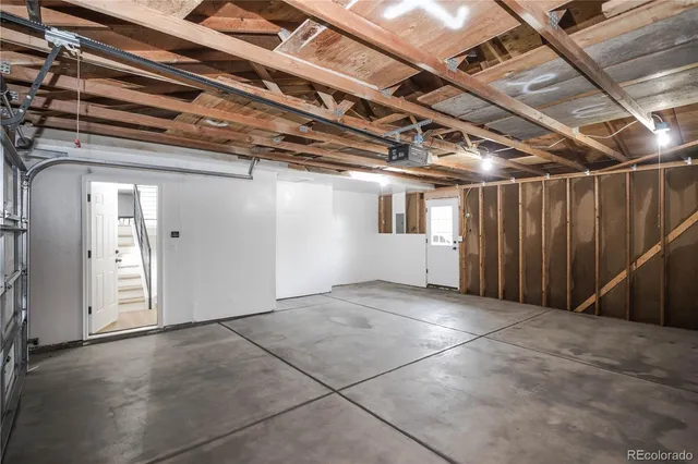 a view of a balcony with wooden floor and fence