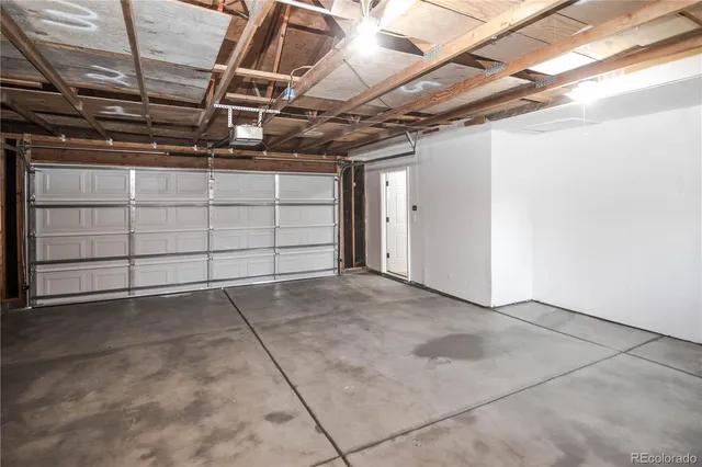 a view of balcony with wooden floor and fence