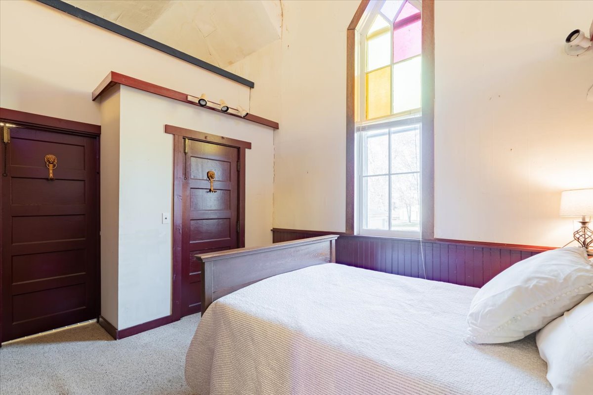 269 Chicago Street Dewitt, IL 61735 - Photo 14 of 34 a bedroom with a bed and a window