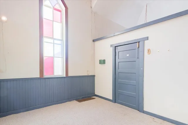 an empty room with windows