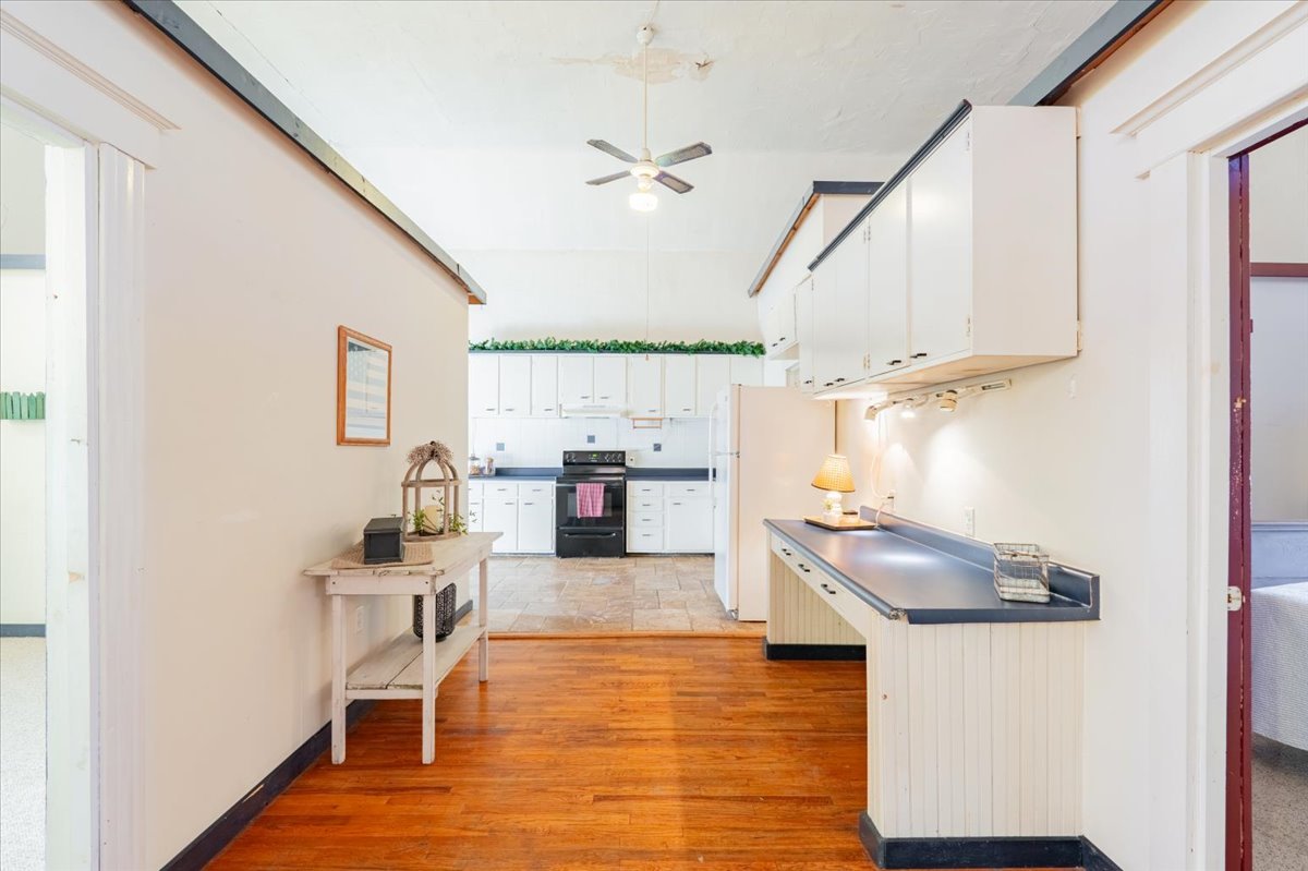 269 Chicago Street Dewitt, IL 61735 - Photo 18 of 34 a living room with furniture and a wooden floor