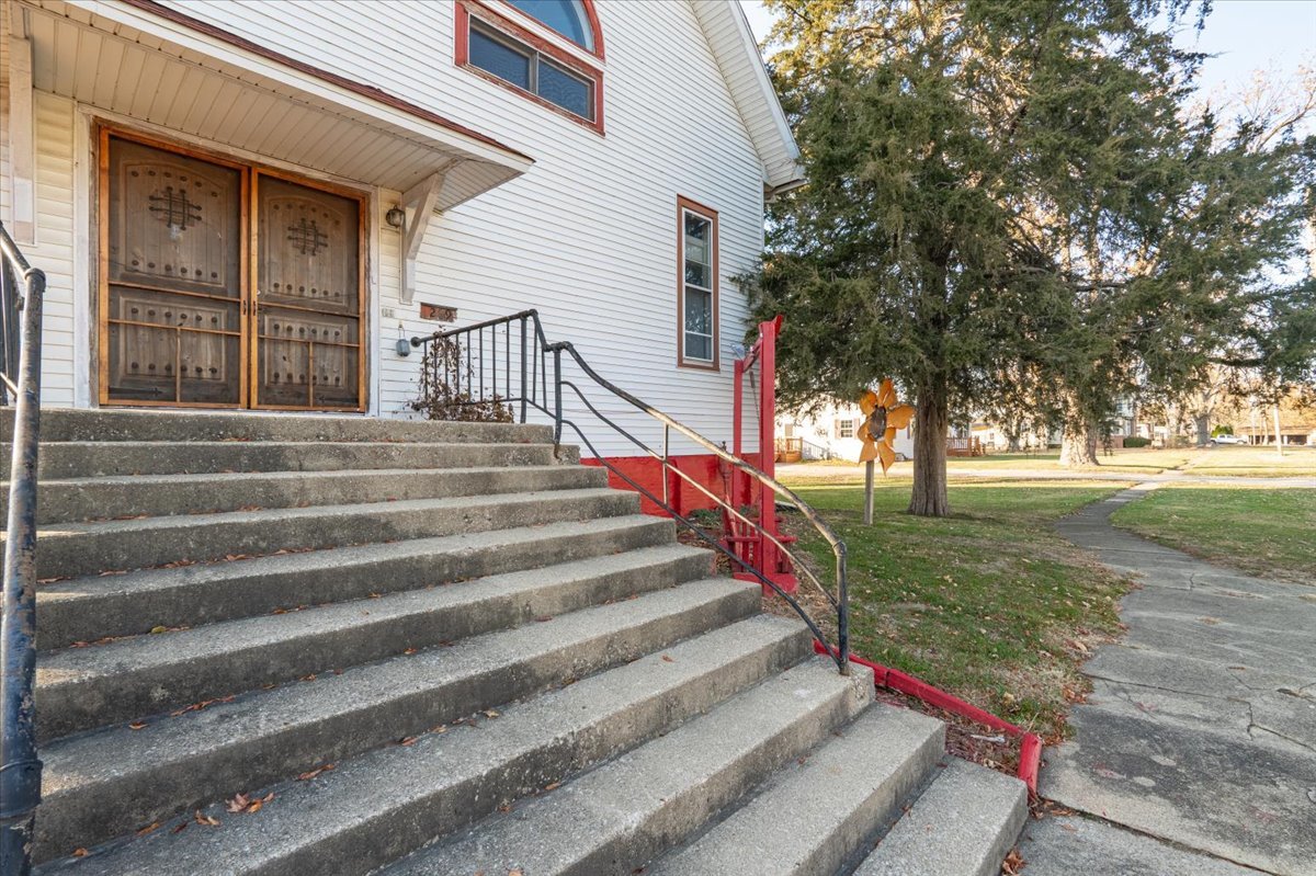 269 Chicago Street Dewitt, IL 61735 - Photo 2 of 34 a view of a house with a yard