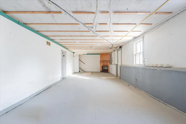 a view of a room with an empty space