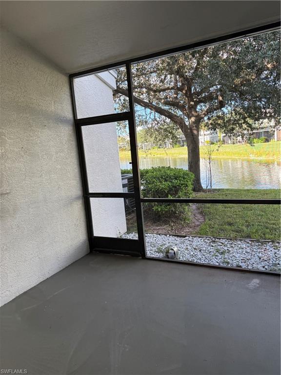 15155 Summit Pl Circle, Unit 232 Naples, FL 34119 - Photo 20 of 27 a view of swimming pool from a balcony