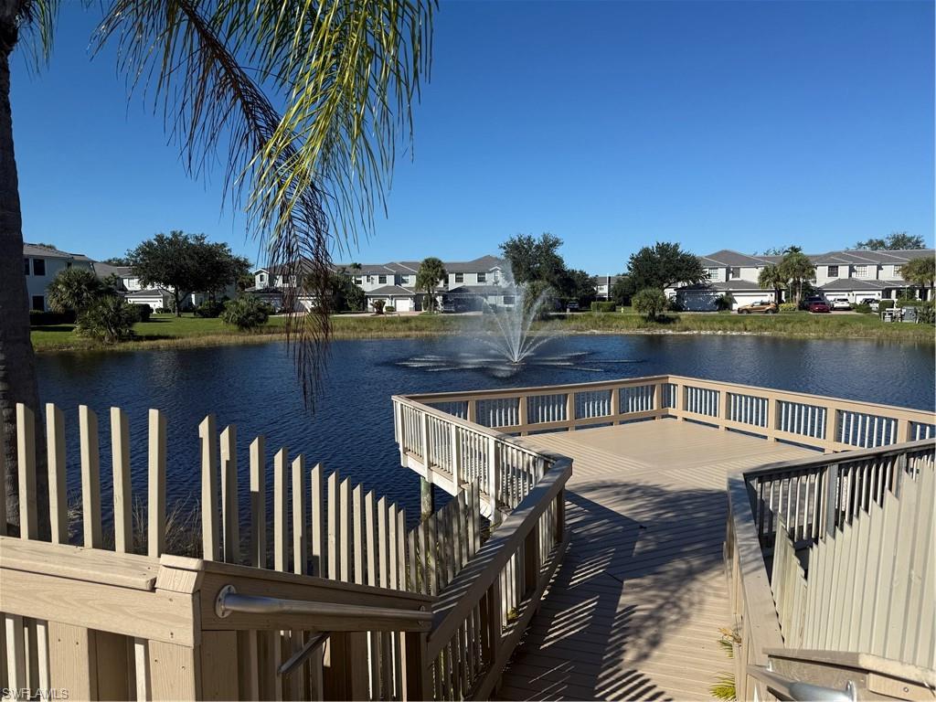 15155 Summit Pl Circle, Unit 232 Naples, FL 34119 - Photo 24 of 27 a terrace with outdoor seating and city view