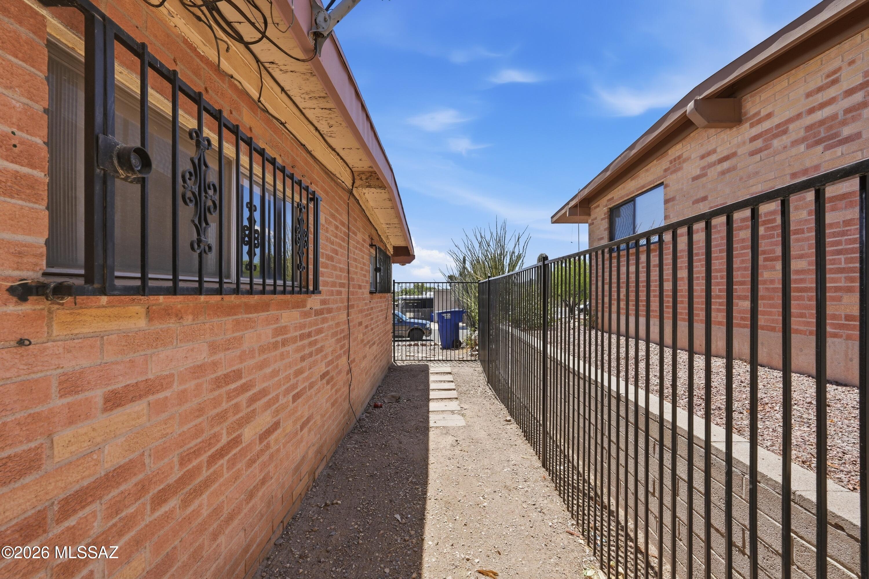 1808 West Caravelle Road Tucson, AZ 85713 - Photo 38 of 38 a view of a pathway of a building