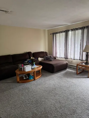 a car parked in a room with a window