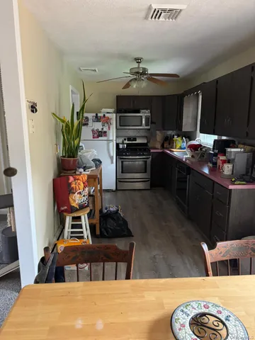 a room with furniture and a flat screen tv