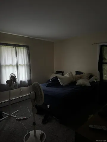 a room with furniture and a window