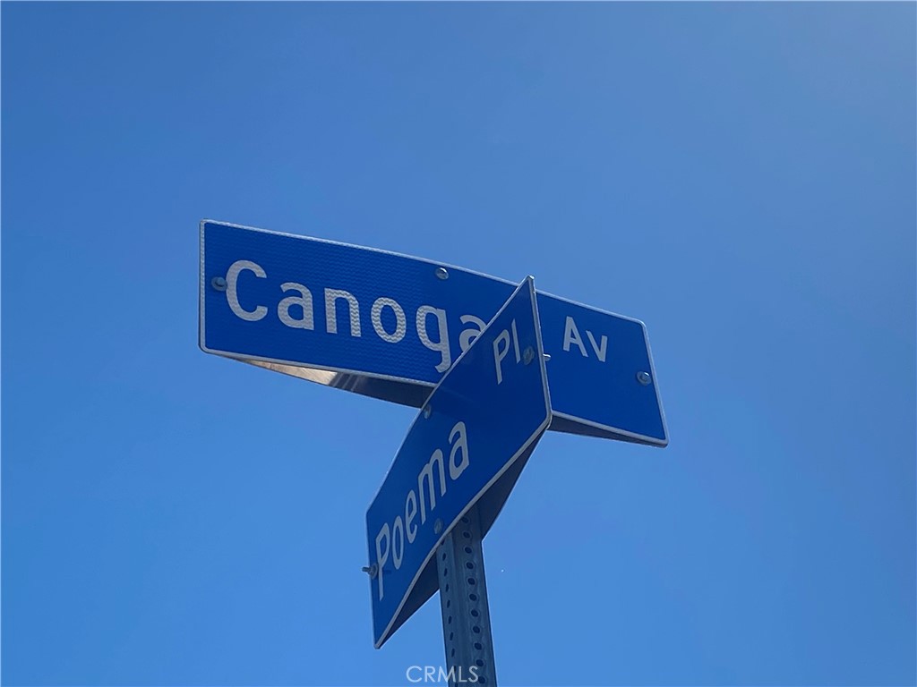 2 Coya Trail Chatsworth, CA 91311 - Photo 16 of 18 a close up of a street sign
