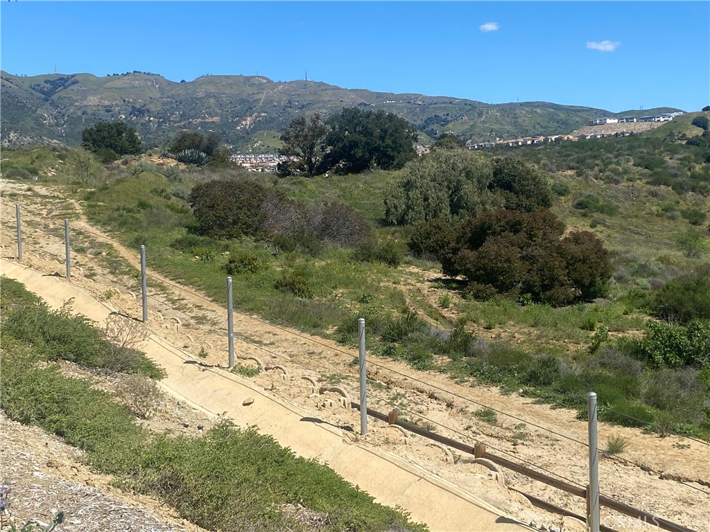 2 Coya Trail Chatsworth, CA 91311 - Photo 3 of 18 a view of a mountain from a yard
