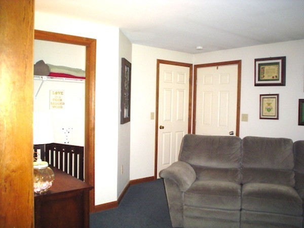 54 Willard Road Ashburnham, MA 01430 - Photo 5 of 11 a living room with furniture and a window