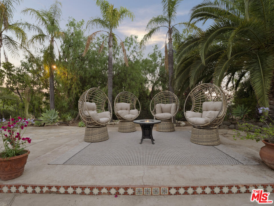 1351 Decker Road Malibu, CA 90265 - Photo 20 of 54 a view of a backyard with garden and plants
