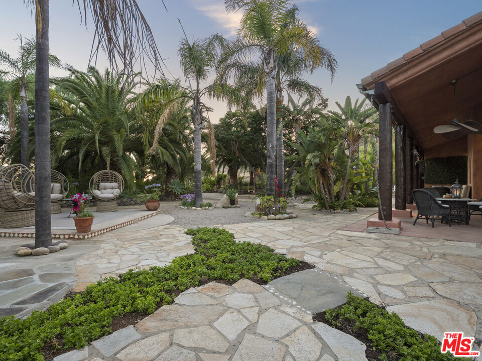 1351 Decker Road Malibu, CA 90265 - Photo 21 of 54 a view of a park with palm trees